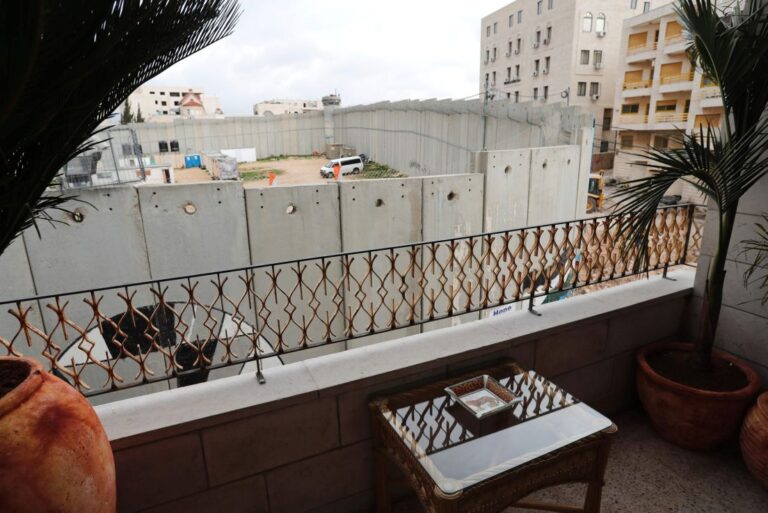 Banksy Withdraws Invitation to Fatboy Slim to Perform at Walled Off Hotel
